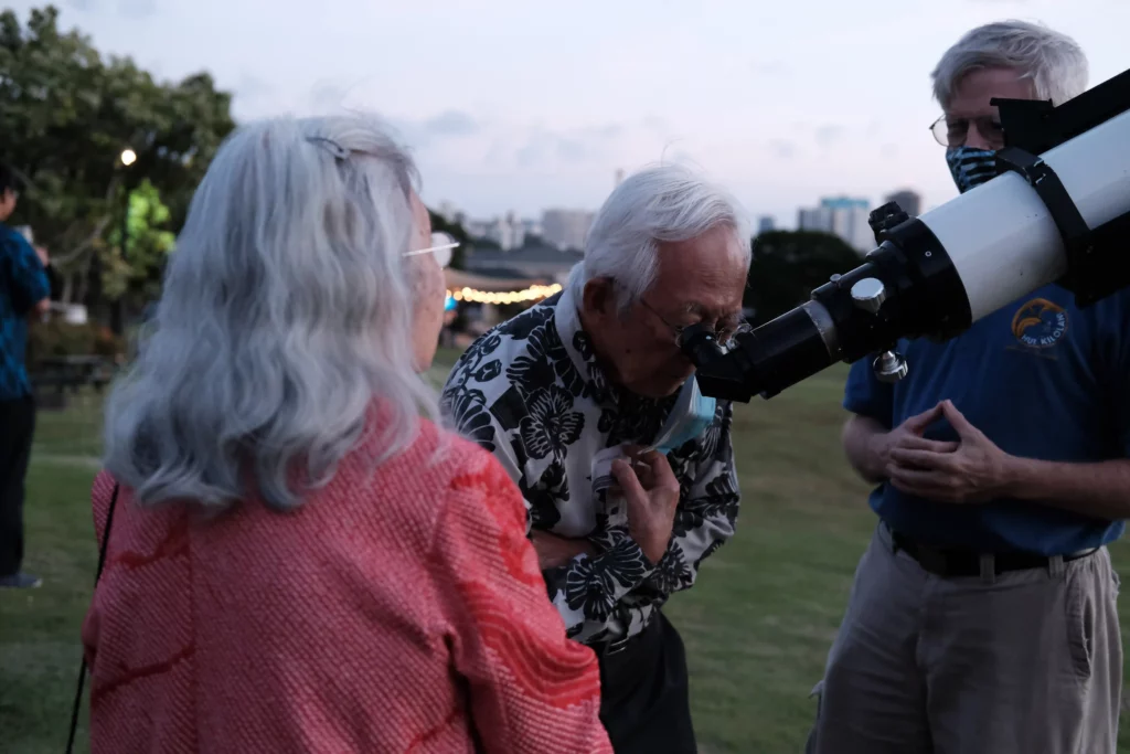 Corporate event attendees at the 60th anniversary of the Jhamandas Watumull Planetarium in Hawaii.